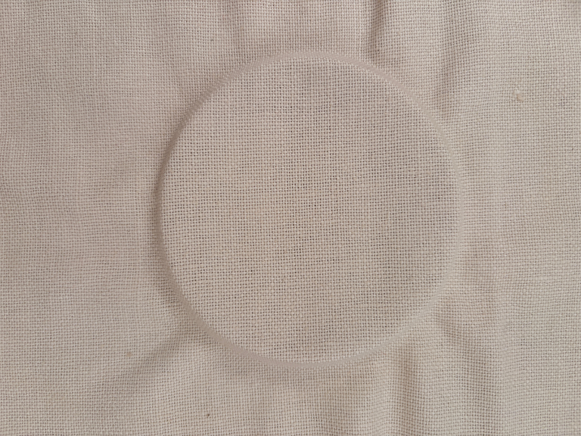Creases left on fabric by embroidery hoop