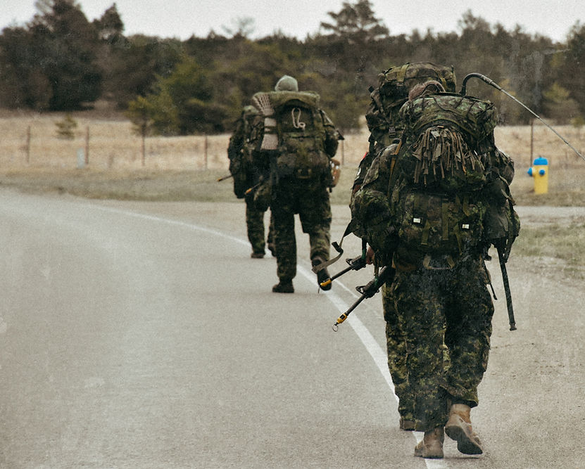 a group of soldiers walking down a road_edited.jpg