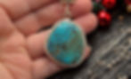 Vivid blue turquoise with red web matrix set in Sterling pendant. Old stock turquoise from the Bijiashan turquoise mine