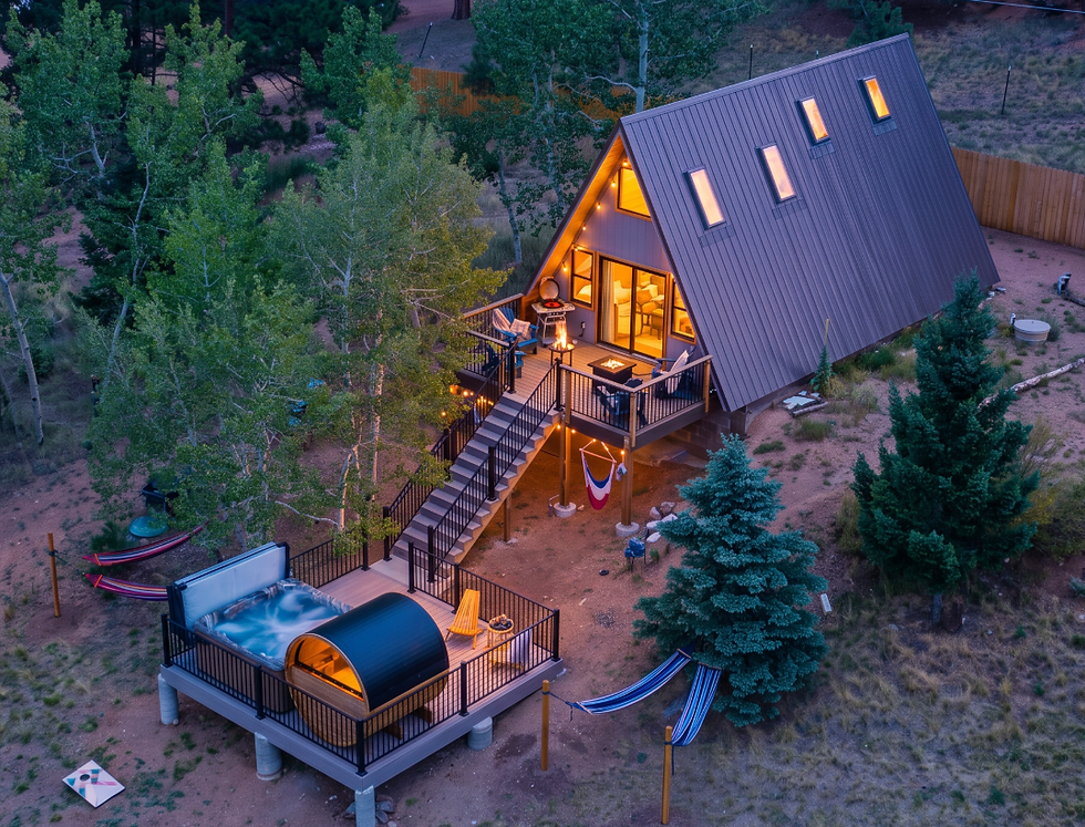 Luxury A-frame vacation rental in Woodland Park and Divide featuring evening outdoor amenities, co-hosted by The Evergreen Escapes.