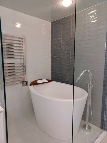 Japanese soaker tub, steam shower, euro glass, heated towel holder, tile install, bathroom design, walk in shower 