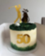 Golf theme 50th birthday cake with golfer and golf bag
