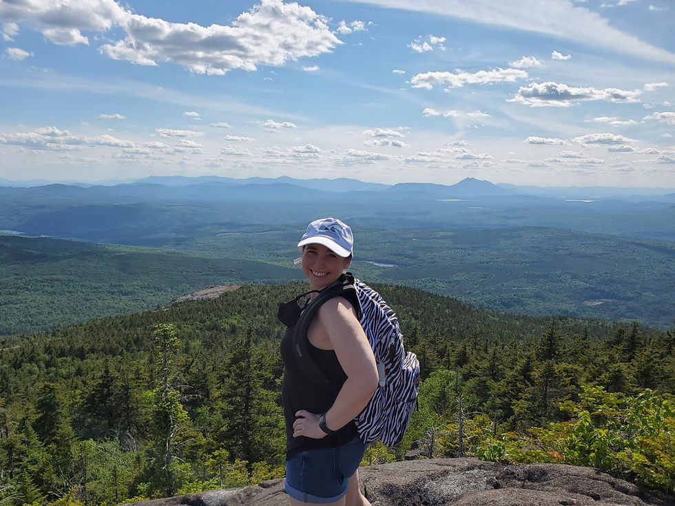 Eye-level view of a mountain trail with rocky terrain