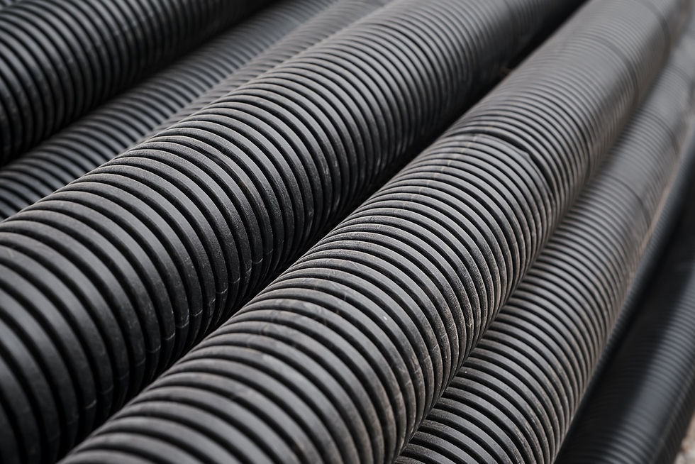 black-building-pipes-selective-focus-coated-corrugated-pipes-road-electrical-network-repai