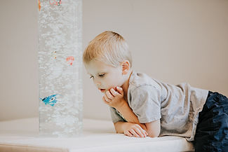 Boy watching bubbles in the sensory room - Grace Community Church, Cranberry Township PA