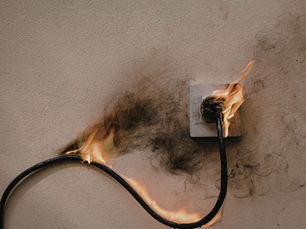 electrical fire in a power point after being overloaded