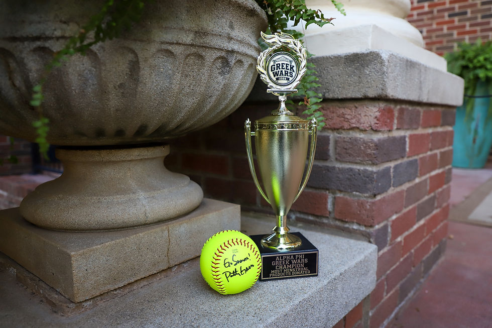 Signed softball and Greek Wars trophy at the Alpha Phi sorority house on Oct. 21. Photo by: Ava Cappotelli