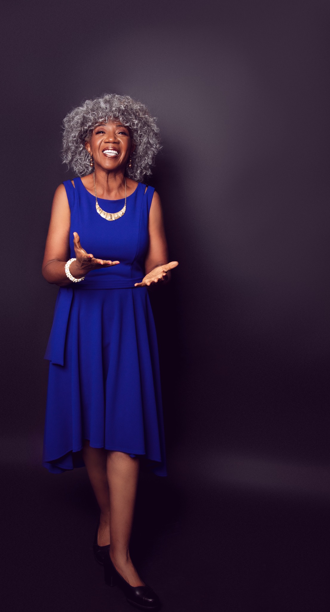 Dr. Carrie Spell-Hansson in a blue dress