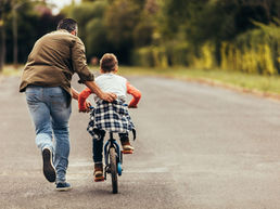From Wobbles to Wheels: How Kids Have Learned to Ride Bikes Through the Years — and How Is Flex Guiders Revolutionizing It?