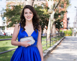 Young woman modeling a purse