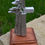 Thumbnail: Large pewter stand on wooden base