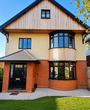 Castle Road project after renovation including new roof, 30 solar panels, new lime render, new windows and doors and cedar cladding