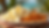Eye-level view of a tropical snack platter featuring popcorn and pretzel sticks