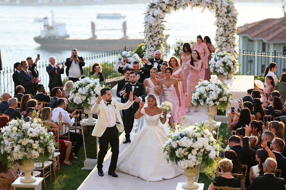 A destination wedding couple walking on the isle at Adile Sultan Palace