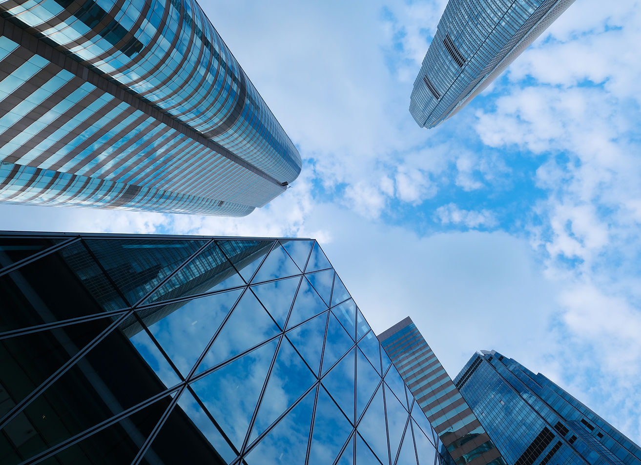 low-angle-view-modern-buildings-against-sky.jpg