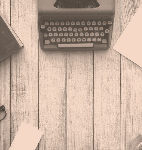 aerial-view-of-typewriter-eyeglasses-and