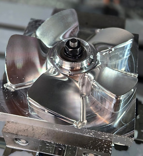 Simultaneous 5-axis CNC machining of complex aluminum impeller for aerospace