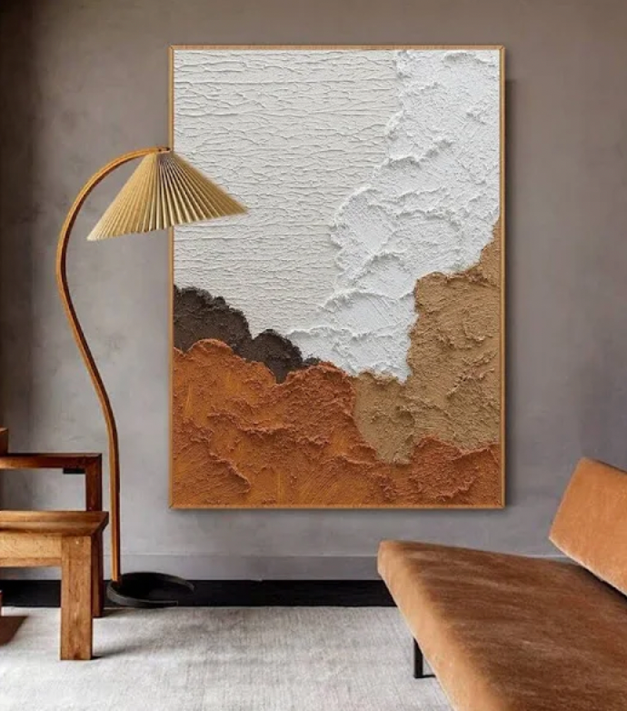Large textured wall art in a living room