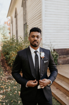 groom solo wedding photos black suit