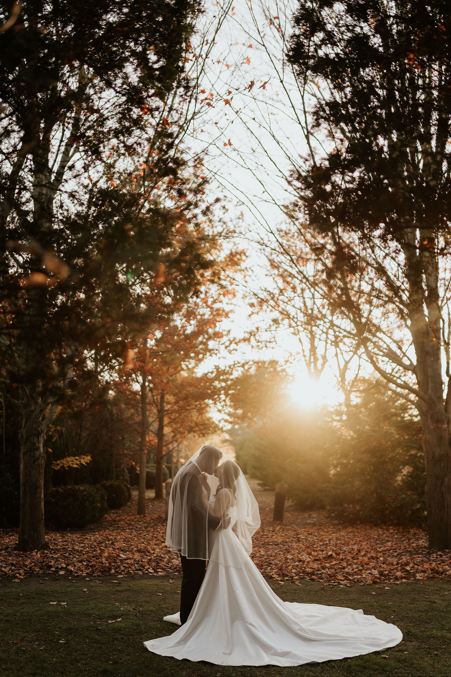 Interracial couple fall wedding at sunset