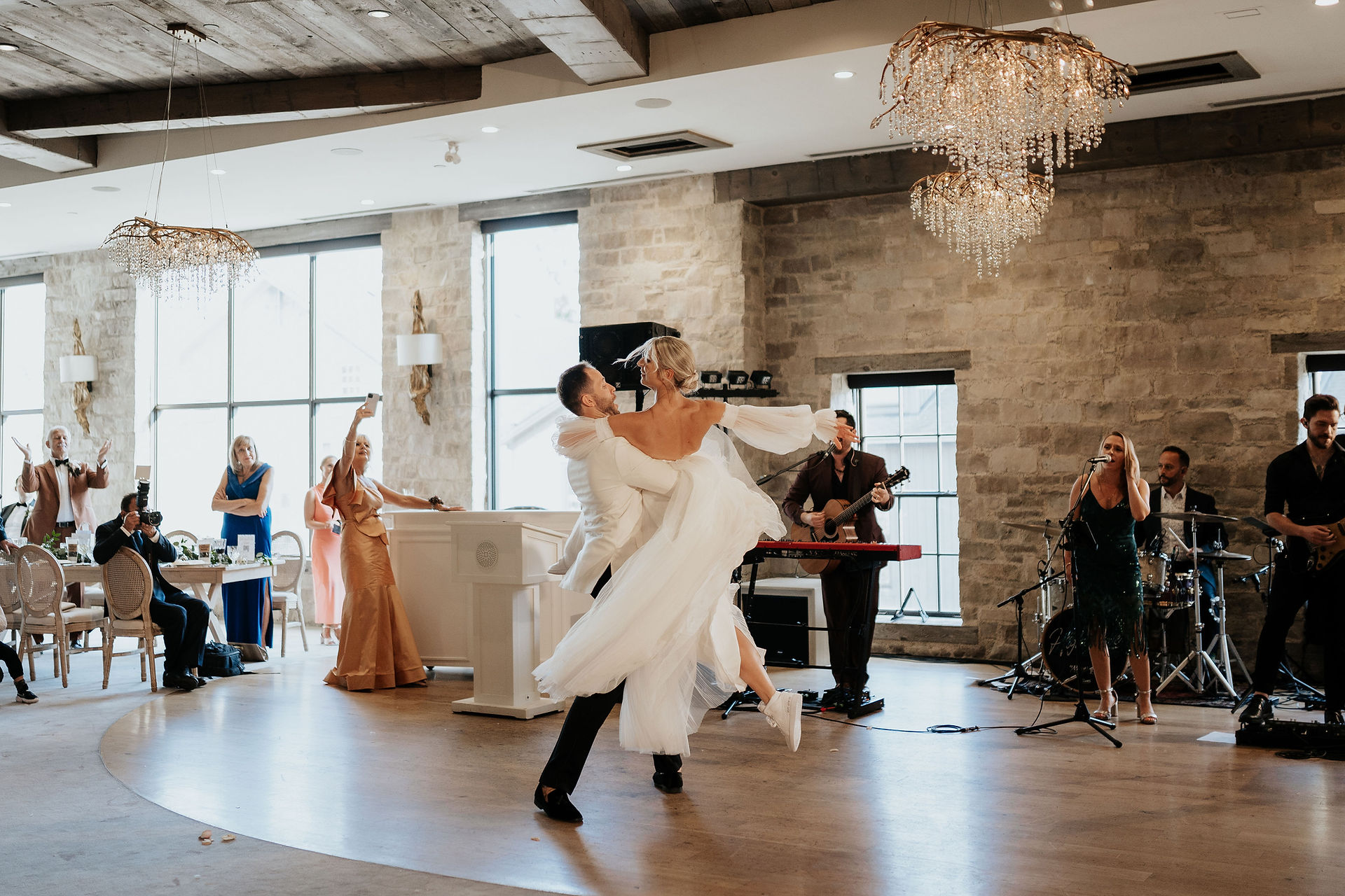 reception at elora mill grand room dinner and bride and groom first dance