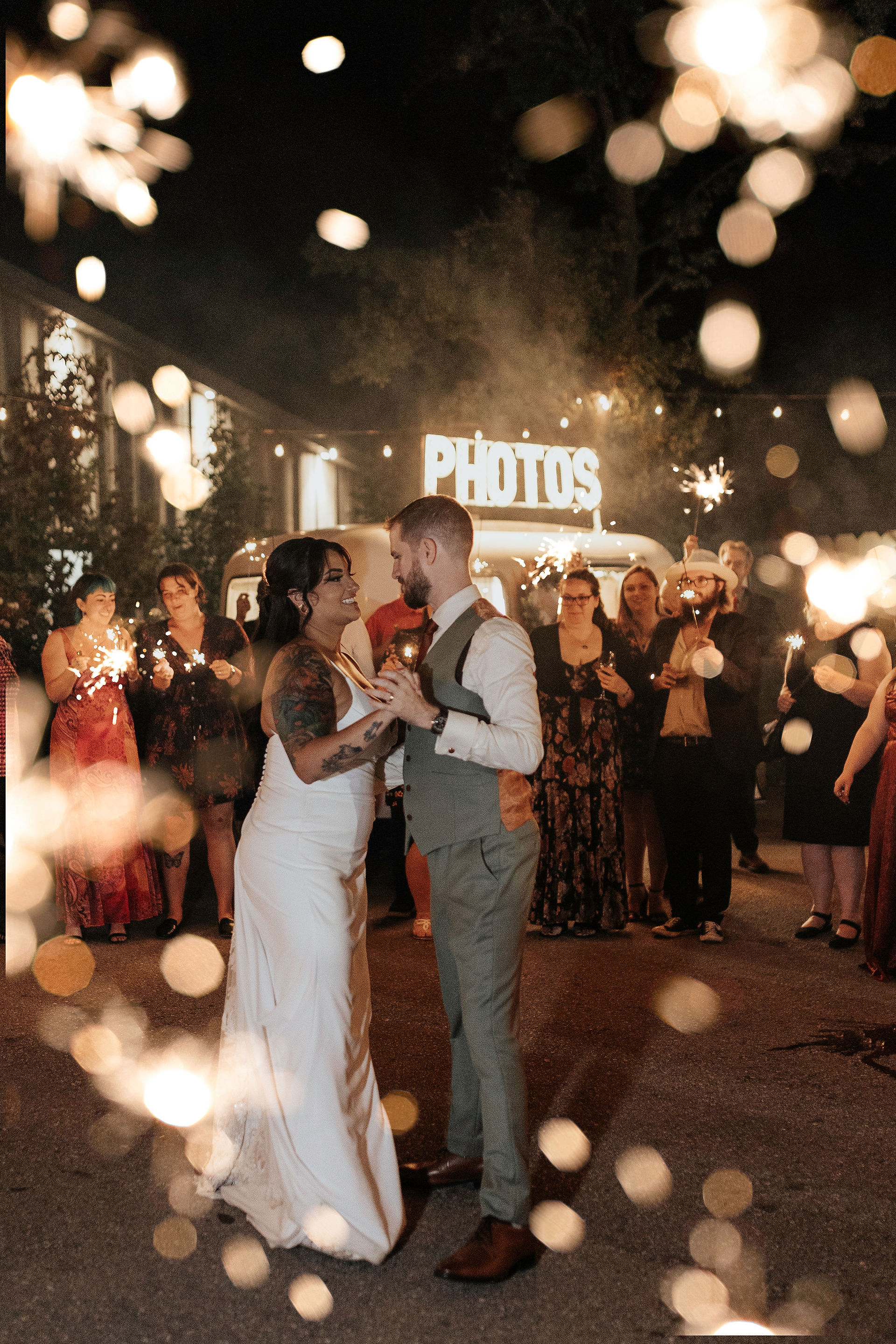 first dance outside with sparklers at earth to table the farm