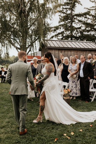 earth to table the farm bride and groom during ceremony
