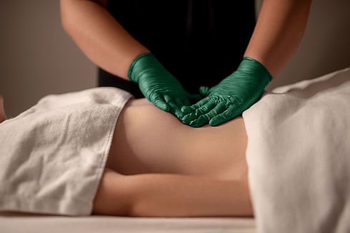 Client receiving a lymphatic drainage treatment