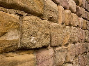 Retaining wall construction with natural stone terracing for commercial property in Ventura County