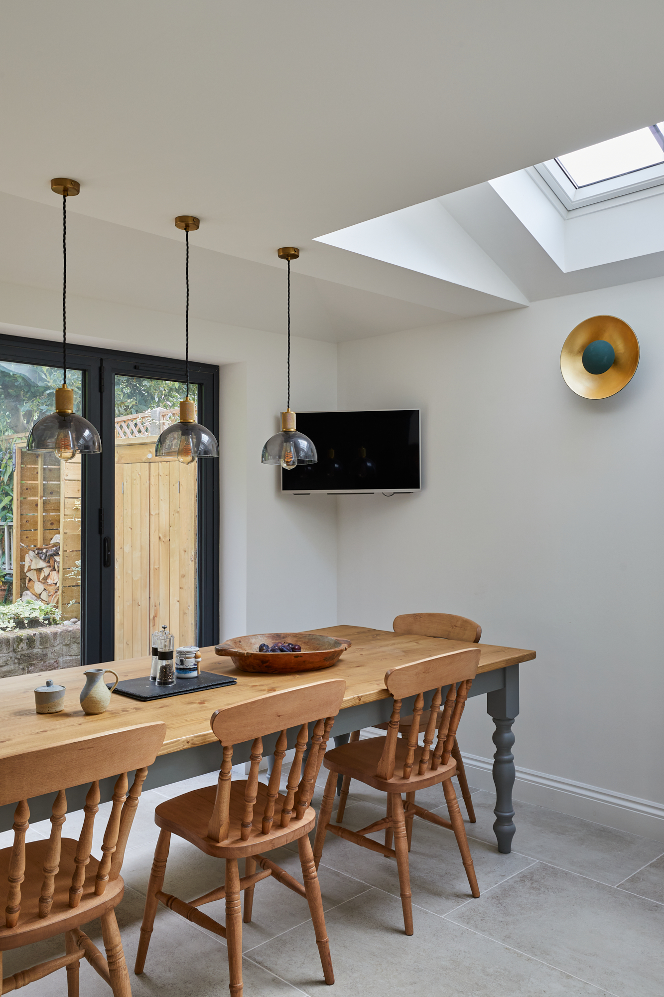 Completed Islington house renovation with open-plan dining, roof glazing and a view across the living accommodation