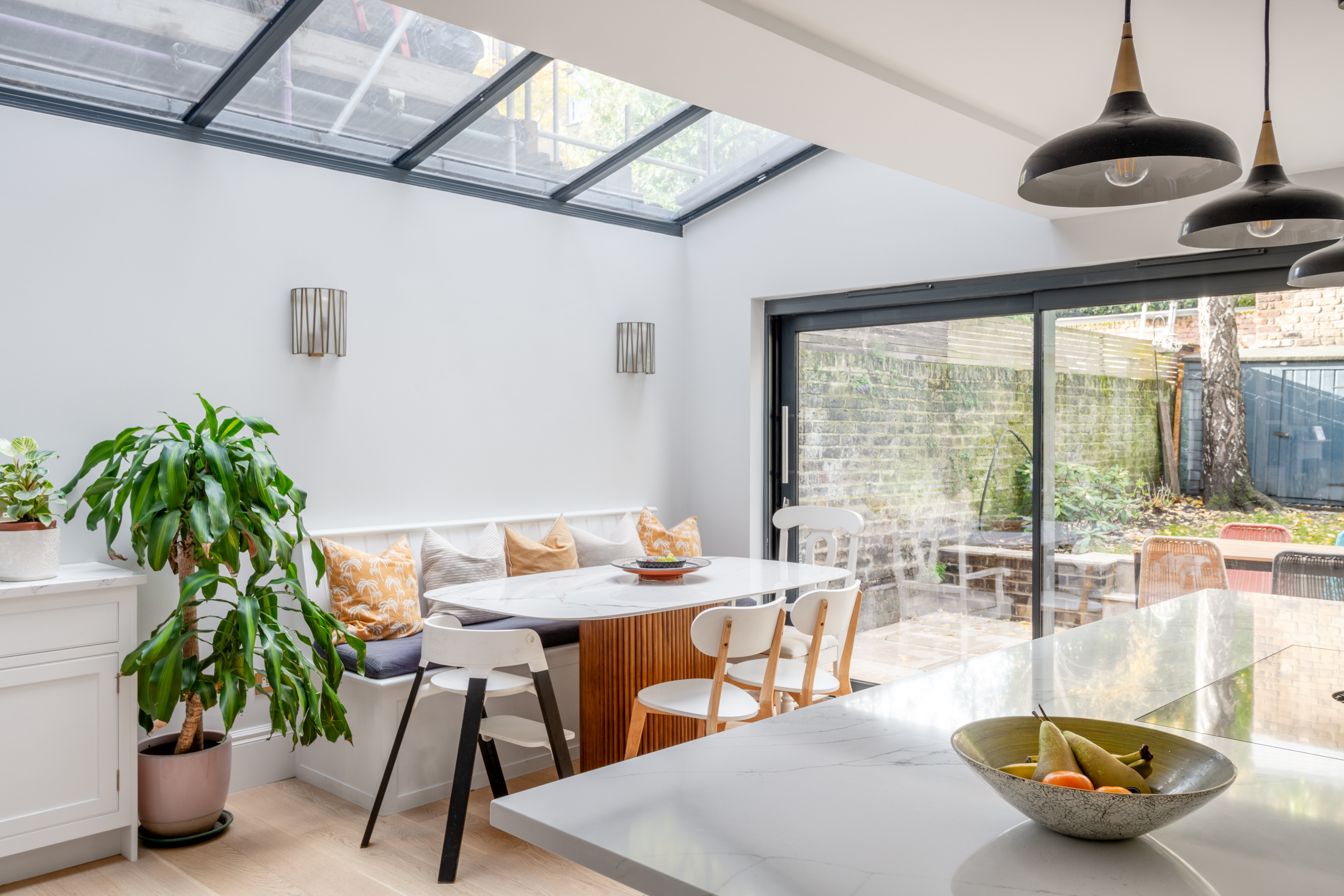 Completed Camden NW5 extension with a naturally lit dining area and large roof glazing
