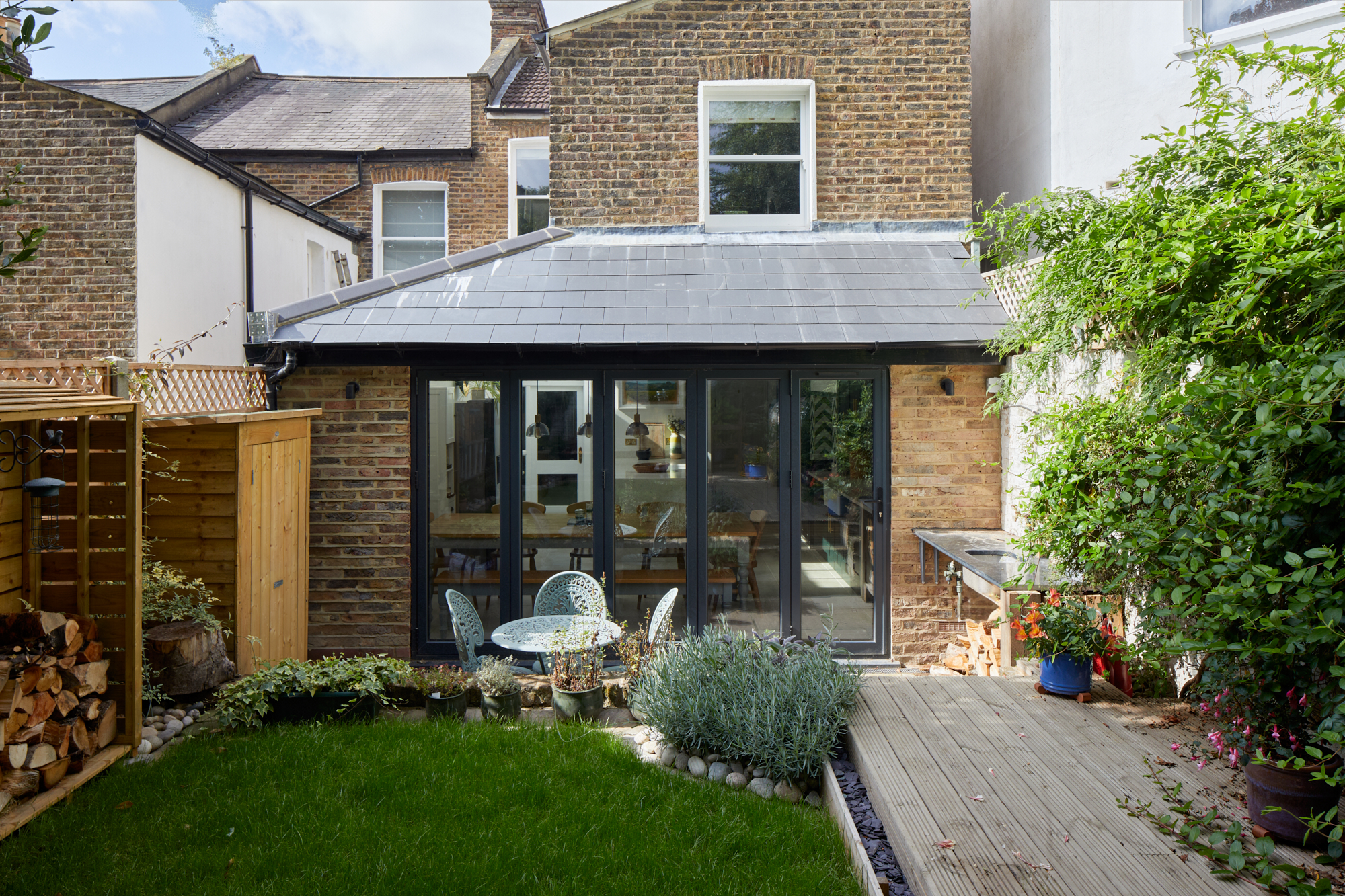 Islington N19 extension opening through glazed doors to a landscaped garden