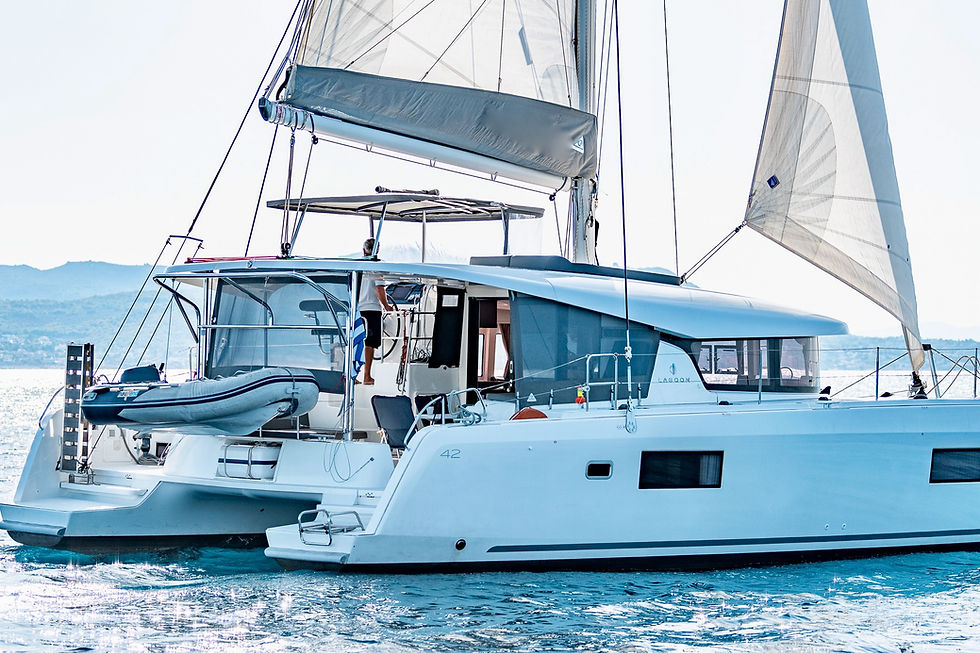 Thumbnail: New Lagoon 42 catamaran bareboat charter stern view in Little Cyclades