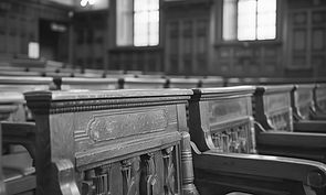 vecteezy_ai-generated-classic-courtroom-interior-with-wooden-bench_40298406_edited.jpg