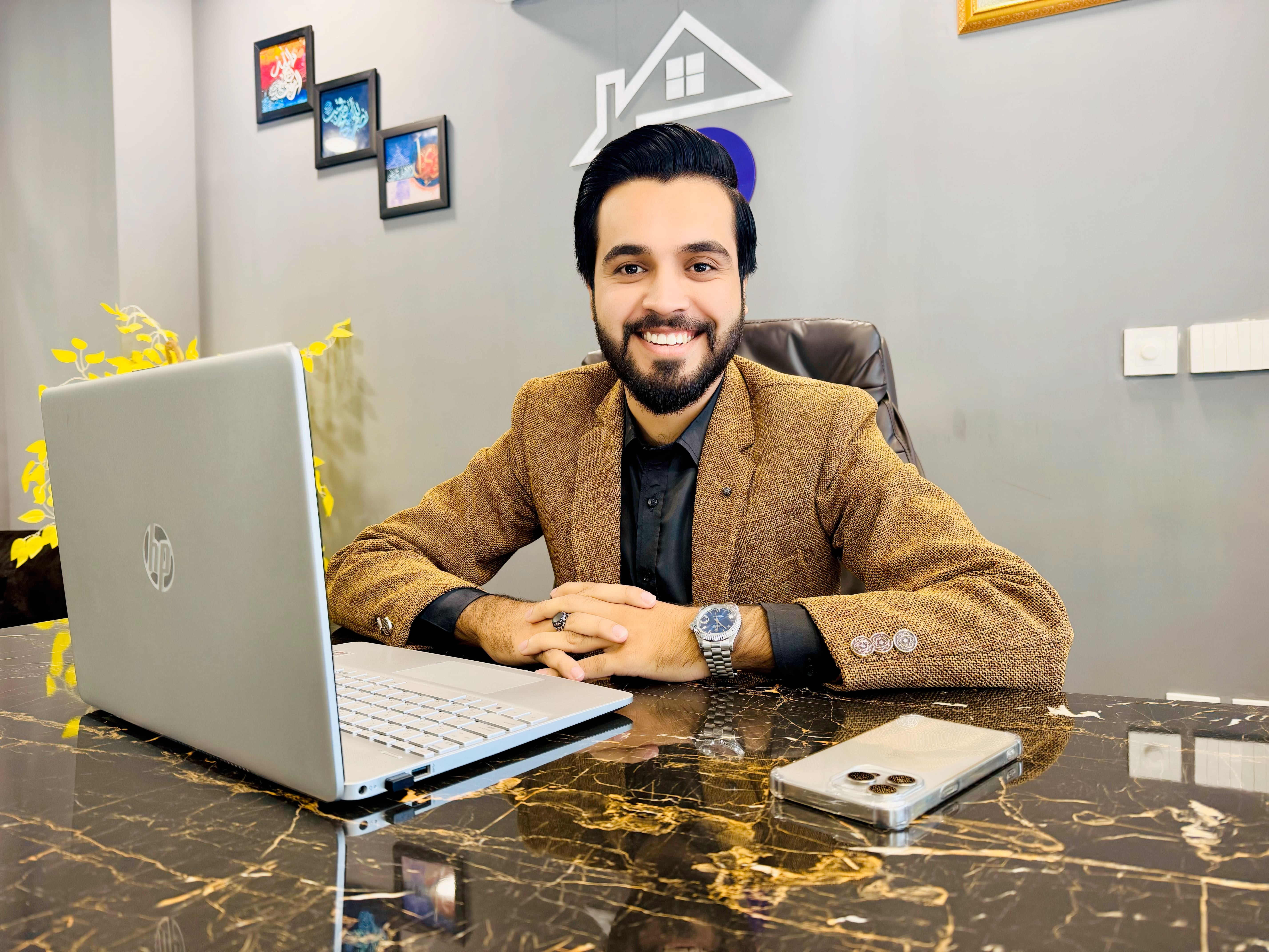 Hamza speaking at an event