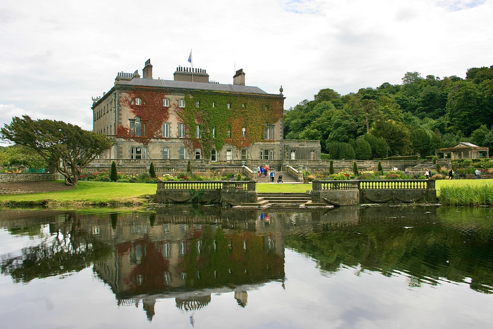 Ivyclad Westport House reflecting in the Carrowbeg river