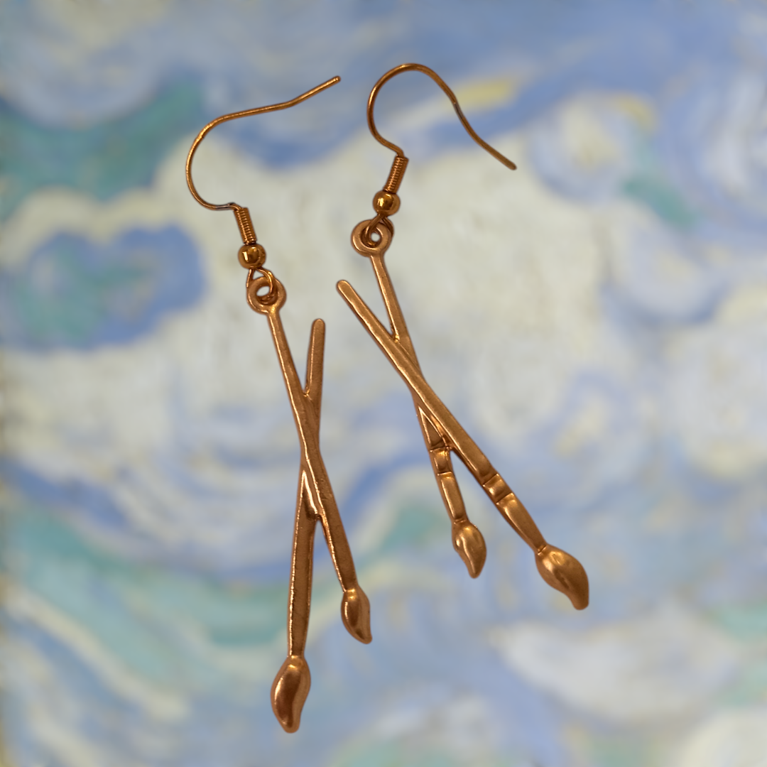 Golden paint brushes