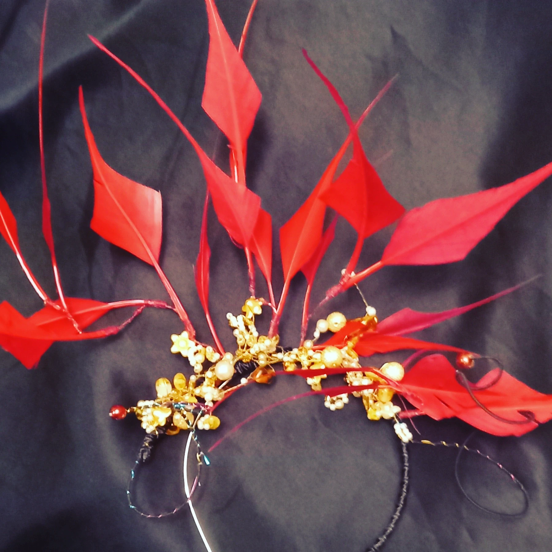 Feather trees and beaded headpiece