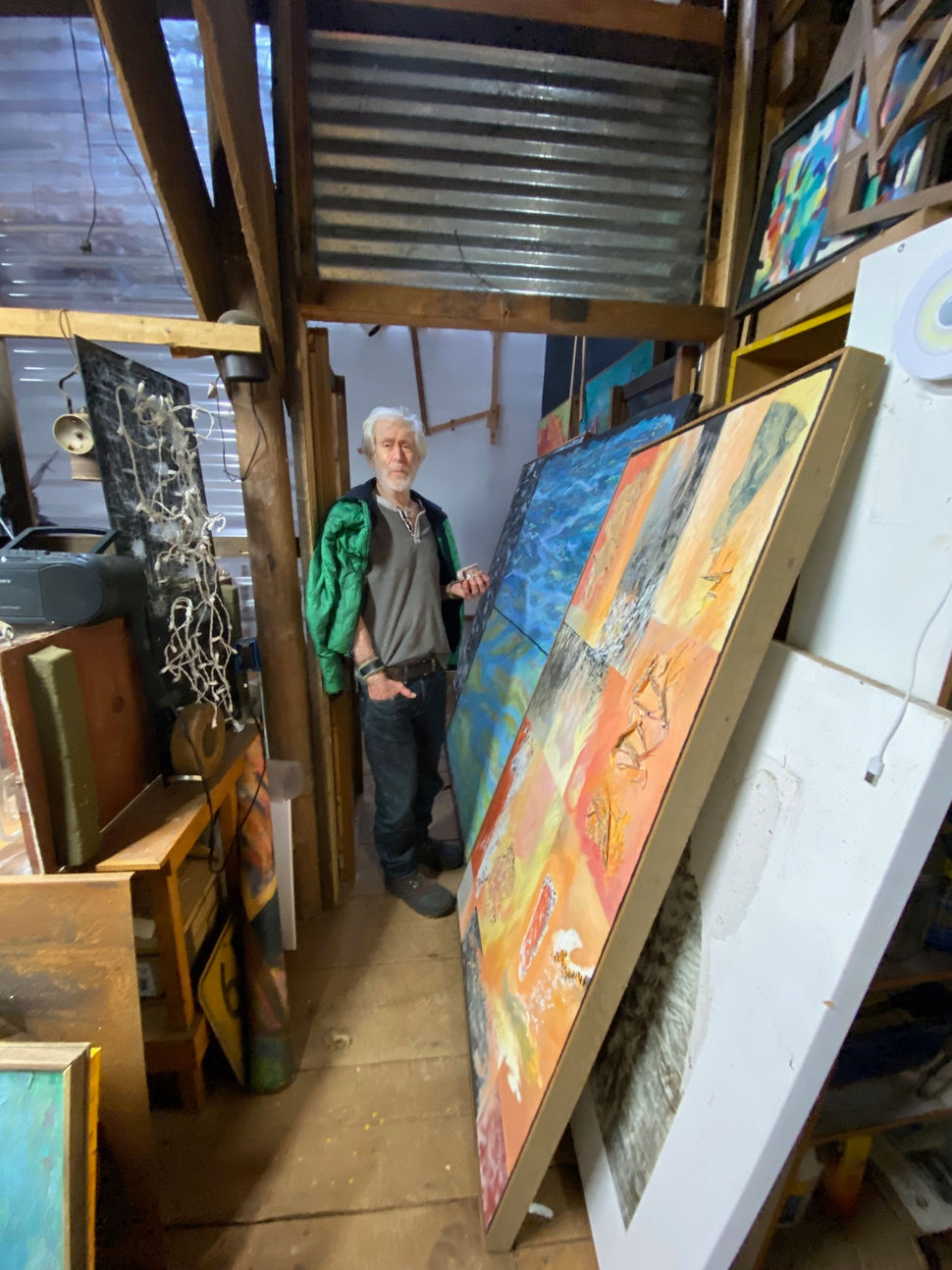Jim with paintings