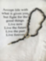 collier noir et argenté fermoir coulissant