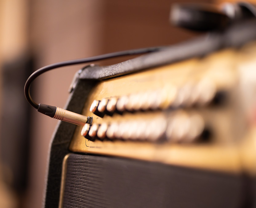 Guitar amplifier on bokeh light colored background, classic vintage rock sound. DSL20c tub