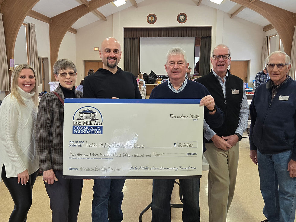 Pictured left to right: Theresa Schroeder (LMACF), Pam Lazaris (LMACF), Aaron Kuhl (Lake Mills Optimist Club), Rick Mason (LMACF), Jim Colegrove (LMACF), Wayne Magnussen (LMACF)