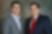 Two professional men smiling, part of Our Team