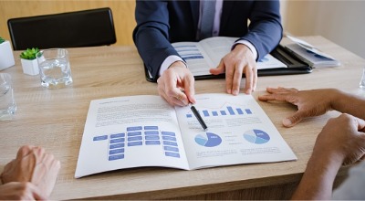 advisor explaining info to couple