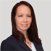 Professional headshot of a woman at Our Firm