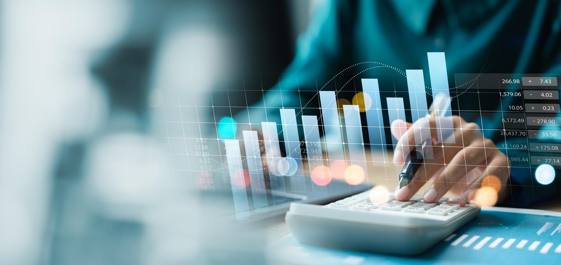 Person using a calculator with a rising bar graph overlay