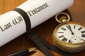 Rolled Last Will and Testament document with a pocket watch