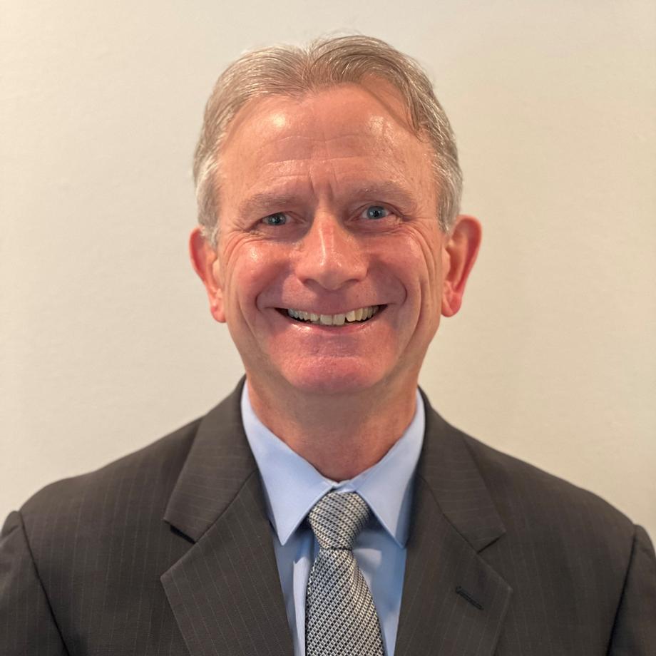 Smiling man in a suit and tie
