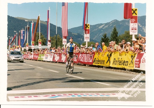 Cyclist crossing the finish line at World Masters 2002