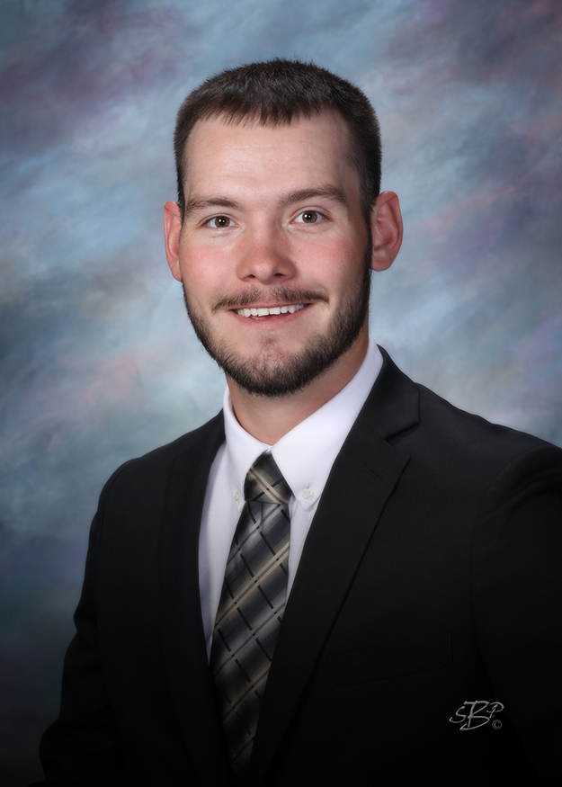 Portrait of a TCB Insurance Team member in a suit and tie.